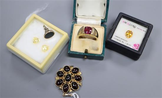A 9ct gold and cabochon set pendant, a 9ct gold ring, three unmounted stones and a bloodstone set seal(a.f.).